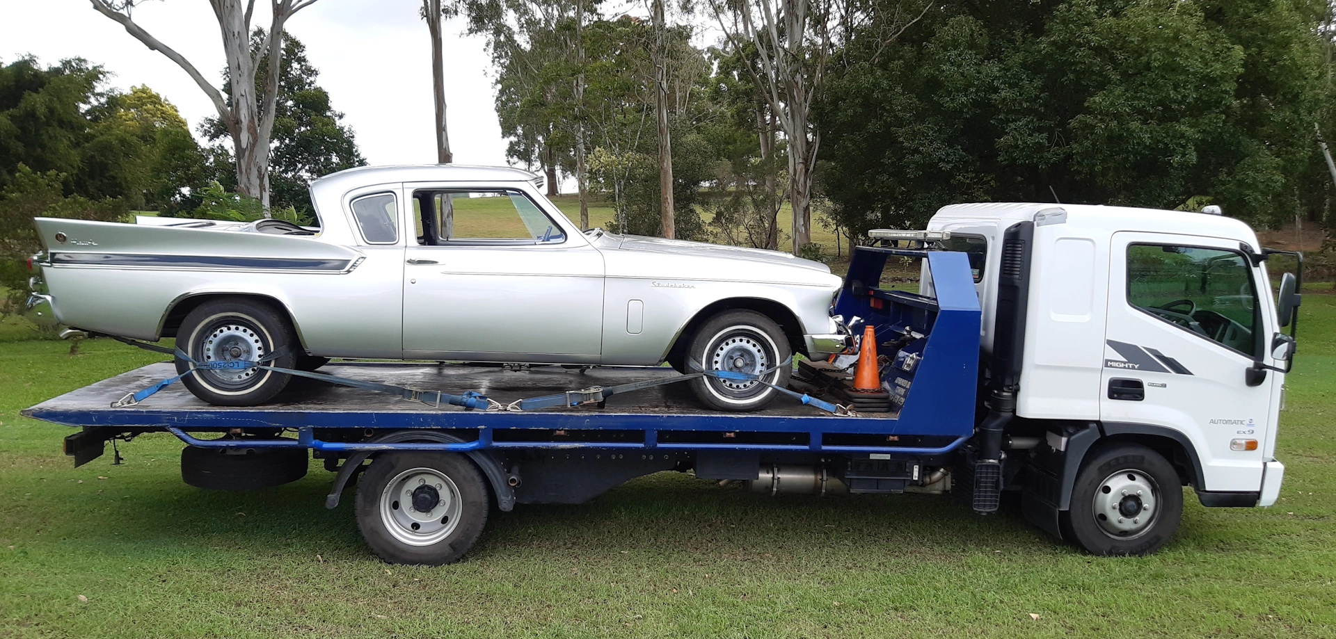 Silver Studebaker Hawk classic car on tow truck in Alexandra Hills QLD