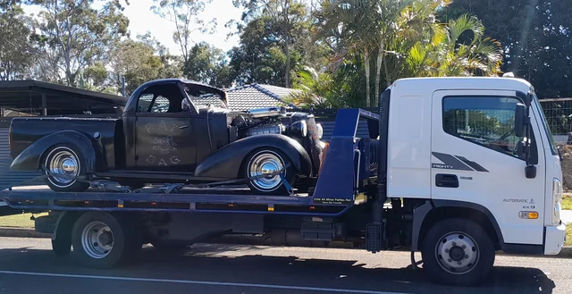 Vintage pickup hot rod secured on the Advanced Blue Towing tilt tray